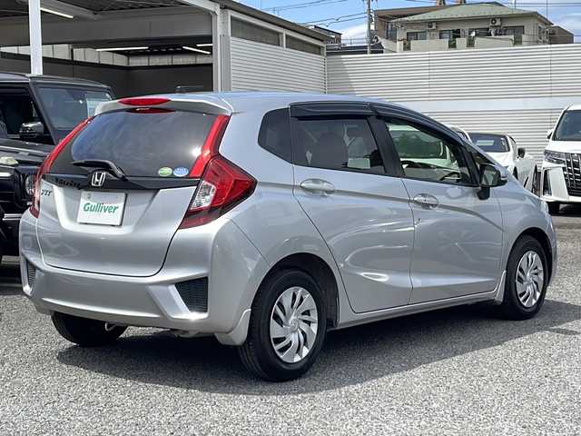 ホンダ フィット 13G Fパッケージ 東京都 2015(平27)年 2.4万km アラバスターシルバーメタリック ワンオーナー/新車時保証書/取扱説明書【車両/ナビ】/アイドリングストップ/純正メモリーナビ/ワンセグTV【VXM-145VSi】/SD/CD/DVD/BT/USB/バックカメラ/純正ドライブレコーダー/Egプッシュスタート/ ストップボタン/スマートキー/ヘッドライトレベライザー