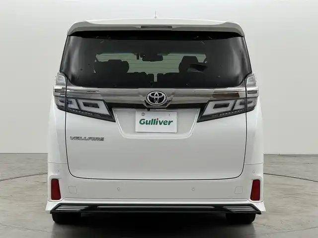 トヨタ ヴェルファイア Z Gエディション 福岡県 2018(平30)年 9.5万km ホワイトパールクリスタルシャイン ＴＲＤエアロ　/後席モニター　/純正１０型ナビ/フルセグTV　/バックカメラ　/ビルトインＥＴＣ　/ドライブレコーダー　/レーダークルコン　/コーナーセンサー　/衝突軽減ブレーキ　/レーンキープ　/両側電動スライドドア　/シートメモリー付きパワーシート　/シートベンチレーション／ヒーター　/ステアリングヒーター　/パワーバックドア　/３眼ＬＥＤヘッドライト　/社外２０インチアルミホイール