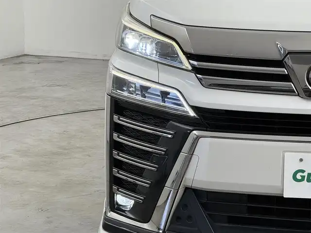 トヨタ ヴェルファイア Z Gエディション 福岡県 2018(平30)年 9.5万km ホワイトパールクリスタルシャイン ＴＲＤエアロ　/後席モニター　/純正１０型ナビ/フルセグTV　/バックカメラ　/ビルトインＥＴＣ　/ドライブレコーダー　/レーダークルコン　/コーナーセンサー　/衝突軽減ブレーキ　/レーンキープ　/両側電動スライドドア　/シートメモリー付きパワーシート　/シートベンチレーション／ヒーター　/ステアリングヒーター　/パワーバックドア　/３眼ＬＥＤヘッドライト　/社外２０インチアルミホイール