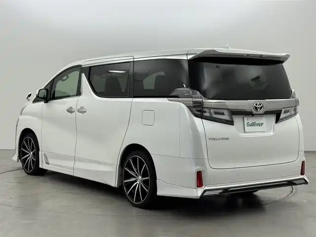 トヨタ ヴェルファイア Z Gエディション 福岡県 2018(平30)年 9.5万km ホワイトパールクリスタルシャイン ＴＲＤエアロ　/後席モニター　/純正１０型ナビ/フルセグTV　/バックカメラ　/ビルトインＥＴＣ　/ドライブレコーダー　/レーダークルコン　/コーナーセンサー　/衝突軽減ブレーキ　/レーンキープ　/両側電動スライドドア　/シートメモリー付きパワーシート　/シートベンチレーション／ヒーター　/ステアリングヒーター　/パワーバックドア　/３眼ＬＥＤヘッドライト　/社外２０インチアルミホイール