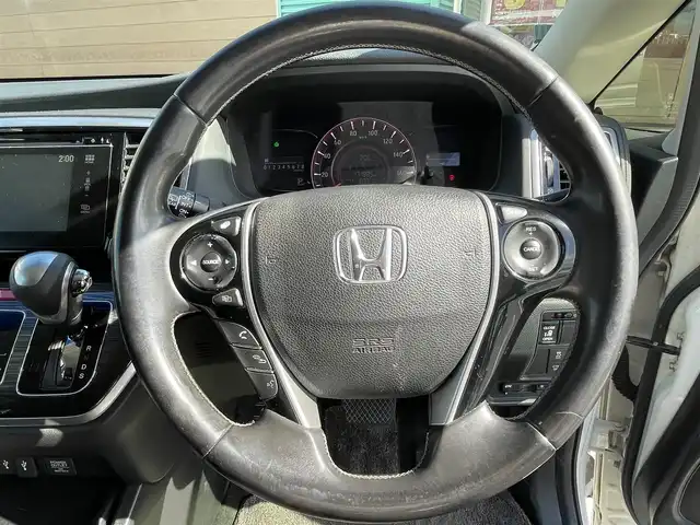 ホンダ オデッセイ アブソルート 長野県 2013(平25)年 17.2万km ホワイトオーキッドパール 純正ナビ（FM/AM、CD、DVD、BT、USB、IPOD）/バックカメラ/フルセグテレビ/ビルトインETC/アイドリングストップ/クルーズコントロール追従無/前後ドライブレコーダー/片側パワースライドドア/純正フロアマット/社外スタッドレス１６AW/横滑り防止装置/ダブルサイドエアバック/キセノンオートヘッドライト/スペアキー（１本）
