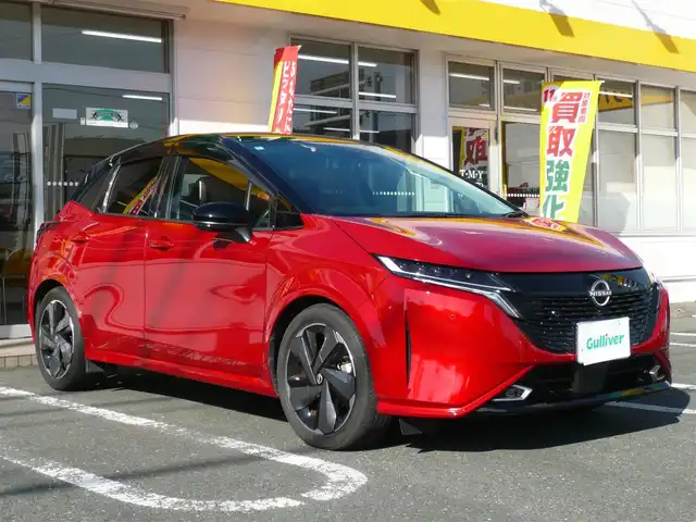 日産 オーラ G 静岡県 2022(令4)年 1.4万km ガーネットレッド/スーパーブラック 2トーン ワンオーナー/禁煙車/プロパイロット/・ハンドル支援/・レーダークルーズ/・レーンキープアシスト/ニッサンコネクトナビ/アラウンドビューモニター/フルセグテレビ/Bluetooth/USB・HDMI/置くだけ充電/デジタルインナーミラー/BOSEサウンド/オートハイビーム/オートライト/LEDヘッドライト/電動パーキング/AUTO HOLD/スマートキー/スペアキー/フロアマット/ドアバイザー/ビルトインETC/新車保証書/取扱説明書