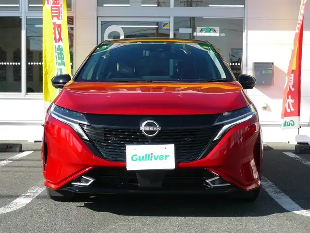 日産 オーラ G 静岡県 2022(令4)年 1.4万km ガーネットレッド/スーパーブラック 2トーン ワンオーナー/禁煙車/プロパイロット/・ハンドル支援/・レーダークルーズ/・レーンキープアシスト/ニッサンコネクトナビ/アラウンドビューモニター/フルセグテレビ/Bluetooth/USB・HDMI/置くだけ充電/デジタルインナーミラー/BOSEサウンド/オートハイビーム/オートライト/LEDヘッドライト/電動パーキング/AUTO HOLD/スマートキー/スペアキー/フロアマット/ドアバイザー/ビルトインETC/新車保証書/取扱説明書