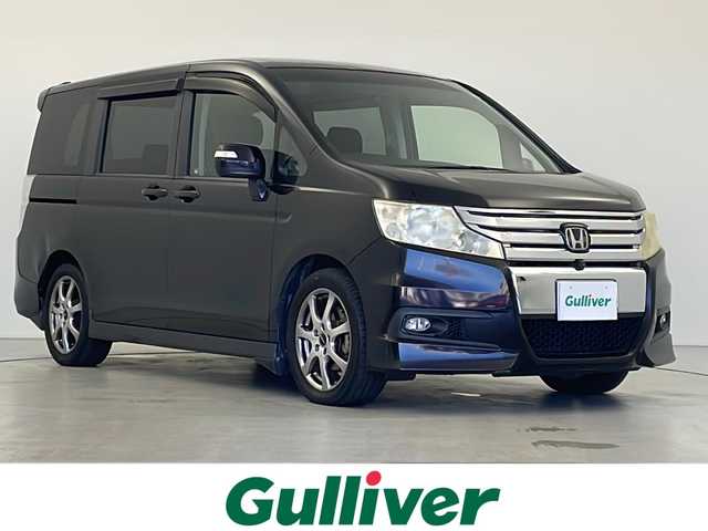 ホンダ ステップワゴン スパーダ Zi 岐阜県 2009(平21)年 13.1万km プレミアムブラキッシュパール フリップダウンモニター/純正HDDナビ/フルセグ　CD　DVD/全方位モニター/パドルシフト/ステアリングスイッチ/ビルトインETC/アダプティブクルーズコントロール/モドゥーロ17インチAW/両側パワースライドドア/サイドバイザー/純正フロアマット/スマートキー