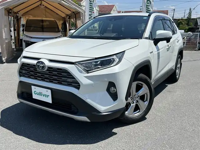 トヨタ ＲＡＶ４ ハイブリットG 長野県 2019(令1)年 11.3万km ホワイトパールクリスタルシャイン 4WD/ワンオーナー/純正ナビ/・Bluetooth/CD/DVD/TV/バックカメラ/純正2.0ETC/電動リアゲート/社外ドライブレコーダー/純正フロアマット/メモリパワーシート/レザーシート/前席シートヒーター/純正18インチAW/前後コーナーセンサー/LEDオートライト/オートマチックハイビーム/ハンドルヒーター/寒冷地仕様/クルーズコントロール追走あり/電格ミラー/ドアバイザー/取り扱い説明書/保証書