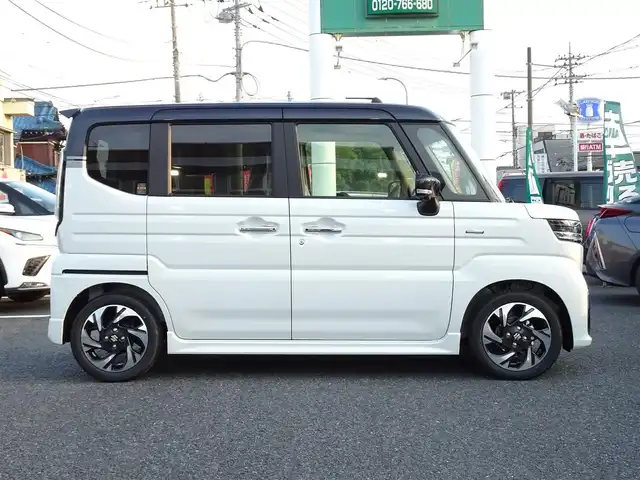 スズキ スペーシア カスタム HYBRID XS 千葉県 2025(令7)年 0.1千km ピュアホワイトパール/ブラック2トーン 【届出済未使用車】/【ピュアホワイトP/ブラック2トーン（C2H）】/LEDヘッドライト/LEDフォグランプ/ヘッドアップディスプレイ/スズキセーティサポート/両側パワースライドドア /ハーフレザーシート/シートヒーター/純正15インチAW/アダプティブクルーズコントロール/プッシュスタート/スマートキー2本/プレミアムUV/IRカットガラス/サイド/カーテンエアバッグ/保証書/取扱説明書/