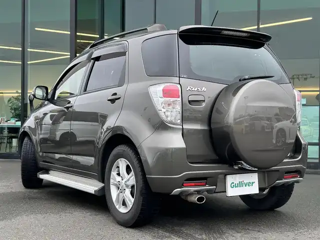 トヨタ ラッシュ G Lパッケージ 東京都 2012(平24)年 4.8万km ブロンズオリーブパールメタリック ４WD/ETC/ドアバイザー/サイドステップ/革巻きステアリング/電動格納ミラー/純正フロアマット/フォグライト/背面タイヤ