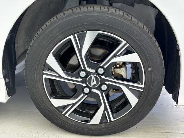 ダイハツ タント カスタム X 愛知県 2023(令5)年 2.3万km ブラックマイカメタリック/シャイニングホワイトパール ワンオーナー/禁煙車/スマートアシスト/・先行車発進システム/・車線逸脱警報システム/・レーンキープアシスト/・コーナーセンサー/両側電動スライドドア/ALPINE ワイド プレミアム メモリーナビ/・型番：NMZL-W73D/・CD/DVD/Bluetooth/フルセグTV/・アダプティブクルーズコントロール/全方位カメラ/ビルトインETC/ハーフレザーシート/DN席シートヒーター/純正フロアマット/純正ドアバイザー/オートライト/・LEDヘッドライト/・LEDフォグランプ