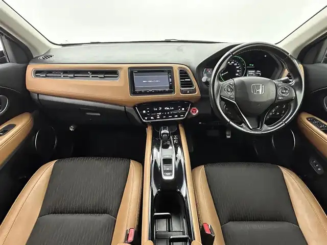 ホンダ ヴェゼル ハイブリッド Z ホンダセンシング 熊本県 2018(平30)年 6.3万km クリスタルブラックパール 純正ナビVXM-185VFi（ＣＤ・ＤＶＤ・フルセグ・ＢＴ・ｉｐｏｄ）/純正前方ドライブレコーダー　/バックカメラ　/ビルトインＥＴＣ　/前席シートヒーター　/前席パワーシート　/ホンダセンシング/・衝突軽減ブレーキ　/・レーダークルーズコントロール/・レーンキープアシスト　/・先行車発進お知らせ機能/・路外逸脱制御機能/・標識認識機能/横滑り防止/パドルシフト/ハーフレザーシート/オートブレーキホールド/純正フロアマット/純正17インチAW/オートライト/LEDヘッドライト/フォグランプ/スマートキー/プッシュスタート/スペアキー1本/保証書/取扱説明書