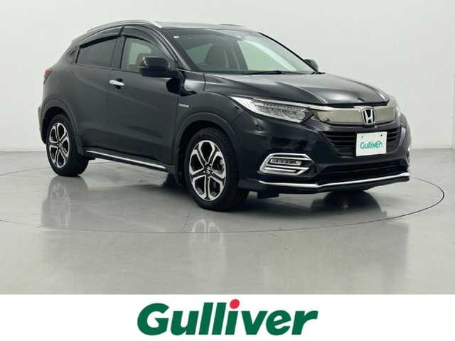 ホンダ ヴェゼル ハイブリッド Z ホンダセンシング 熊本県 2018(平30)年 6.3万km クリスタルブラックパール 純正ナビVXM-185VFi（ＣＤ・ＤＶＤ・フルセグ・ＢＴ・ｉｐｏｄ）/純正前方ドライブレコーダー　/バックカメラ　/ビルトインＥＴＣ　/前席シートヒーター　/前席パワーシート　/ホンダセンシング/・衝突軽減ブレーキ　/・レーダークルーズコントロール/・レーンキープアシスト　/・先行車発進お知らせ機能/・路外逸脱制御機能/・標識認識機能/横滑り防止/パドルシフト/ハーフレザーシート/オートブレーキホールド/純正フロアマット/純正17インチAW/オートライト/LEDヘッドライト/フォグランプ/スマートキー/プッシュスタート/スペアキー1本/保証書/取扱説明書