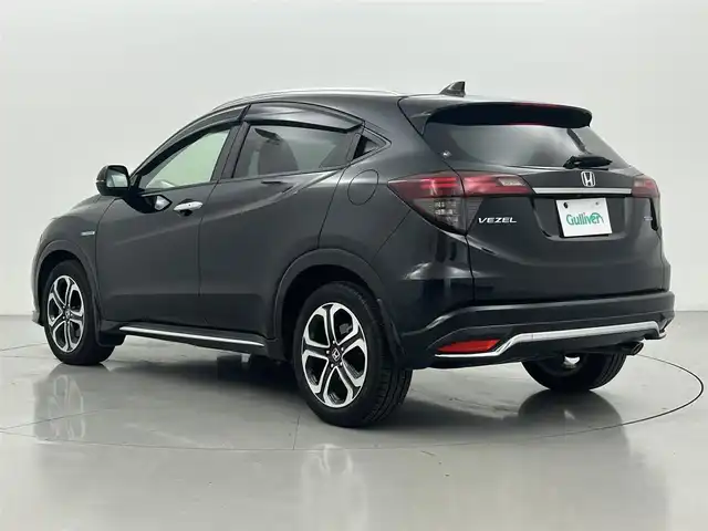 ホンダ ヴェゼル ハイブリッド Z ホンダセンシング 熊本県 2018(平30)年 6.3万km クリスタルブラックパール 純正ナビVXM-185VFi（ＣＤ・ＤＶＤ・フルセグ・ＢＴ・ｉｐｏｄ）/純正前方ドライブレコーダー　/バックカメラ　/ビルトインＥＴＣ　/前席シートヒーター　/前席パワーシート　/ホンダセンシング/・衝突軽減ブレーキ　/・レーダークルーズコントロール/・レーンキープアシスト　/・先行車発進お知らせ機能/・路外逸脱制御機能/・標識認識機能/横滑り防止/パドルシフト/ハーフレザーシート/オートブレーキホールド/純正フロアマット/純正17インチAW/オートライト/LEDヘッドライト/フォグランプ/スマートキー/プッシュスタート/スペアキー1本/保証書/取扱説明書