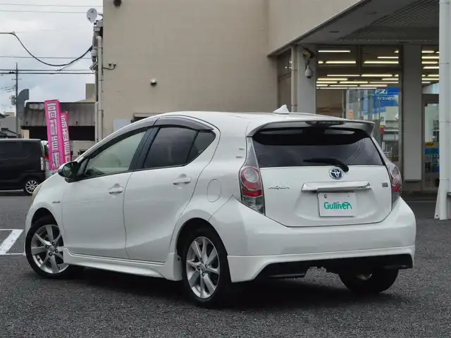 トヨタ アクア G 栃木県 2012(平24)年 11.4万km ライムホワイトパールクリスタルシャイン 社外エアロ/・フロントスポイラー/・サイドスカート/・リアアンダースポイラー/7インチ純正HDDナビ［NHZN-W61G］/・地デジ(フルセグ)/・Bluetooth/・DVD/CD/バックモニター/スマートエントリーパッケージ/・スマートエントリー&スタートシステム/・盗難防止システム/・コンライト/ツーリングパッケージ/・195/50R16タイヤ&16インチアルミホイール/・大型リヤスポイラー/運転席・助手席シートヒーター/ETC