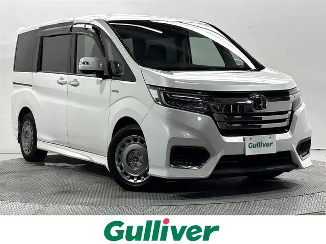 ホンダ ステップワゴン スパーダ ハイブリッド G EX ホンダセンシング 大阪府 2018(平30)年 4.3万km プラチナホワイトパール 純正10incナビTV Bカメラ ETC 黒革シート シートヒーター 衝突軽減 レーダーC レーンアシスト 両側パワースライドドア リアオートエアコン ドラレコ 100V電源