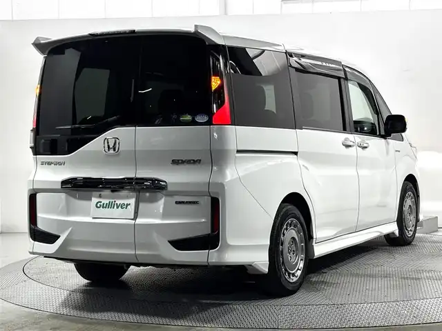 ホンダ ステップワゴン スパーダ ハイブリッド G EX ホンダセンシング 大阪府 2018(平30)年 4.3万km プラチナホワイトパール 純正10incナビTV Bカメラ ETC 黒革シート シートヒーター 衝突軽減 レーダーC レーンアシスト 両側パワースライドドア リアオートエアコン ドラレコ 100V電源