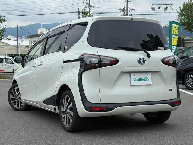 トヨタ シエンタ ハイブリッド G クエロ 長野県 2017(平29)年 4.1万km ホワイトパールクリスタルシャイン トヨタ純正SDナビ（NSZT-W66T）/FM・AM・DVD・CD・フルセグTV/Bluetooth Audio/バックカメラ/純正16インチアルミホイール/スタッドレスタイヤ積み込み/純正エンジンスターター/両側パワースライドドア/前後コーナーセンサー/衝突軽減ブレーキ/ワイパーデアイサー/ドライブレコーダー/ハーフレザーシート/前席シートヒーター/革巻きステアリング/LEDヘッドライト/オートハイビーム/オートライト/フォグランプ/ドアバイザー/プッシュスタート/スマートキー/スペア1本/ETC