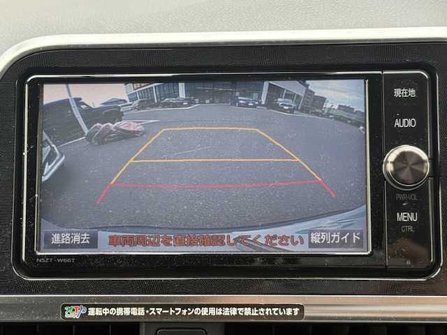 トヨタ シエンタ ハイブリッド G クエロ 長野県 2017(平29)年 4.1万km ホワイトパールクリスタルシャイン トヨタ純正SDナビ（NSZT-W66T）/FM・AM・DVD・CD・フルセグTV/Bluetooth Audio/バックカメラ/純正16インチアルミホイール/スタッドレスタイヤ積み込み/純正エンジンスターター/両側パワースライドドア/前後コーナーセンサー/衝突軽減ブレーキ/ワイパーデアイサー/ドライブレコーダー/ハーフレザーシート/前席シートヒーター/革巻きステアリング/LEDヘッドライト/オートハイビーム/オートライト/フォグランプ/ドアバイザー/プッシュスタート/スマートキー/スペア1本/ETC