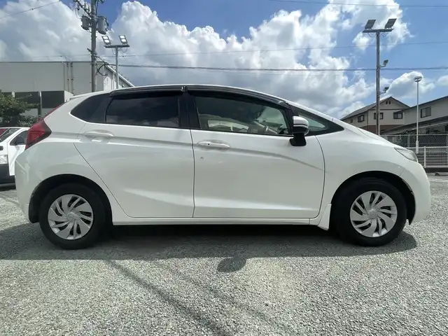 ホンダ フィット 13G Fパッケージ ファインED 熊本県 2017(平29)年 4.6万km プレミアムホワイトパールⅡ ワンオーナー/プッシュスタート/純正ナビ/（CD・DVD・フルセグTV・BTオーディオ・SD）/バックカメラ/横滑り防止装置/ウィンカーミラー/純正フロアマット/純正ドアバイザー/新車保証書/取扱説明書