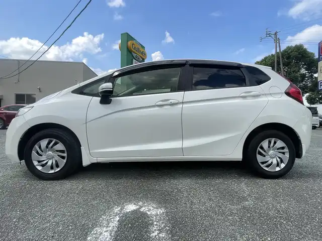 ホンダ フィット 13G Fパッケージ ファインED 熊本県 2017(平29)年 4.6万km プレミアムホワイトパールⅡ ワンオーナー/プッシュスタート/純正ナビ/（CD・DVD・フルセグTV・BTオーディオ・SD）/バックカメラ/横滑り防止装置/ウィンカーミラー/純正フロアマット/純正ドアバイザー/新車保証書/取扱説明書