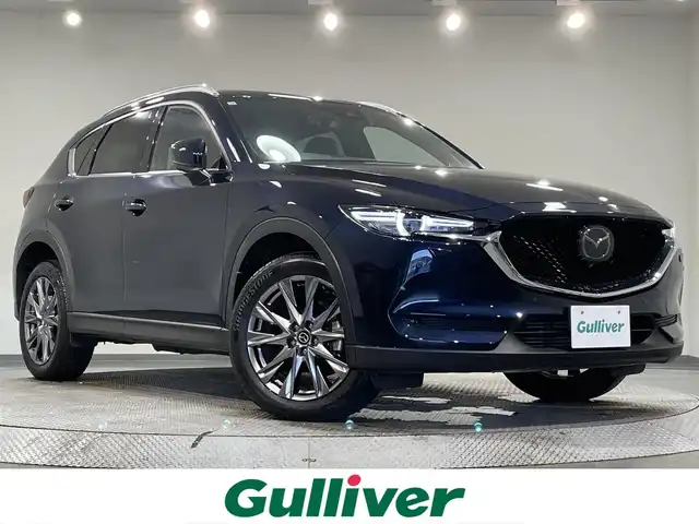 マツダ ＣＸ－５ XD エクスクルーシブモード 愛知県 2021(令3)年 2.5万km ディープクリスタルブルーマイカ 純正１０．２５インチナビ　/（Bluetooth/FM/AM/CarPlay/USB/フルセグTV)/ＢＯＳＥサウンド　/３６０°ビューモニター　/シートヒーター　/電動バックドア　/ＥＴＣ　/衝突軽減ブレーキ/レーダークルーズコントロール　/ステアリングヒーター　/ドライブレコーダー　/メモリー機能付パワーシート/ワイヤレス充電/ブラインドスポットモニター/ヘッドアップディスプレイ/レーンキープアシスト/コーナーセンサー/LEDヘッドライト/LEDフォグランプ/純正フロアマット