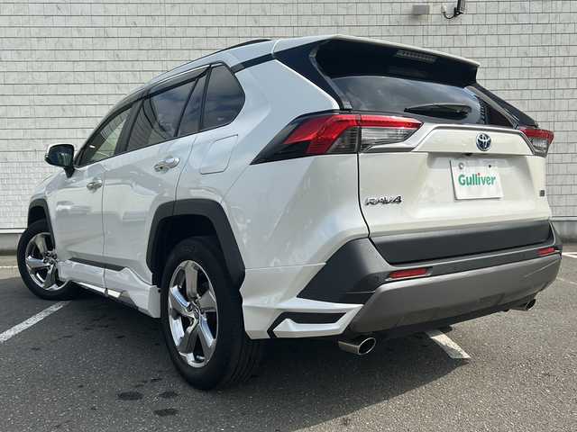 トヨタ ＲＡＶ４ ハイブリットG 秋田県 2020(令2)年 7.5万km ホワイトパールクリスタルシャイン ・４WD/・寒冷地仕様/・純正ナビ/・フルセグ/・Bluetooth/・純正ETC/・前後コーナーセンサー/・シートヒーターD席＋N席/・シートクーラーD席＋N席/・全方位車外カメラ/・追従式クルーズコントロール/・ドラレコ/・スマートキー/・シートヒーター/・パワーシート/・エアロパーツ（モデリスタ）
