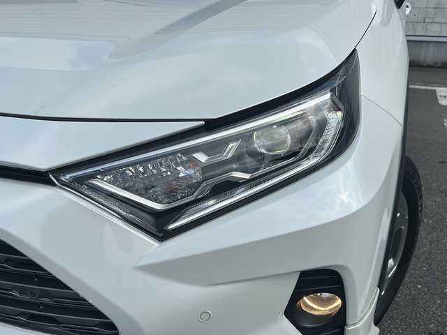 トヨタ ＲＡＶ４ ハイブリットG 秋田県 2020(令2)年 7.5万km ホワイトパールクリスタルシャイン ・４WD/・寒冷地仕様/・純正ナビ/・フルセグ/・Bluetooth/・純正ETC/・前後コーナーセンサー/・シートヒーターD席＋N席/・シートクーラーD席＋N席/・全方位車外カメラ/・追従式クルーズコントロール/・ドラレコ/・スマートキー/・シートヒーター/・パワーシート/・エアロパーツ（モデリスタ）