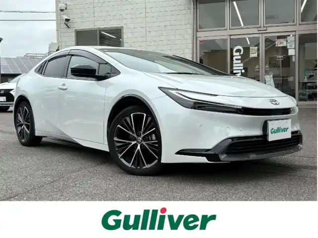 トヨタ プリウス Z 愛知県 2023(令5)年 1.4万km プラチナホワイトパールマイカ ワンオーナー/純正12.3インチナビ/　TV/BT/USB/AM/FM/Miracast/スマホ連携/全方位カメラ/エアーシート/シートヒーター/運転席パワーシート（メモリー付き）/ハンドルヒーター/トヨタセーフティセンス/レーダークルーズ/LKA/BSM/パワーバックドア/デジタルインナーミラー/ワイヤレス充電/ETC2.0/100V電源/電動パーキングブレーキ/オートホールド機能/純正フロアマット/ドアバイザー/スマートキー×2