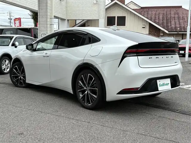 トヨタ プリウス Z 愛知県 2023(令5)年 1.4万km プラチナホワイトパールマイカ ワンオーナー/純正12.3インチナビ/　TV/BT/USB/AM/FM/Miracast/スマホ連携/全方位カメラ/エアーシート/シートヒーター/運転席パワーシート（メモリー付き）/ハンドルヒーター/トヨタセーフティセンス/レーダークルーズ/LKA/BSM/パワーバックドア/デジタルインナーミラー/ワイヤレス充電/ETC2.0/100V電源/電動パーキングブレーキ/オートホールド機能/純正フロアマット/ドアバイザー/スマートキー×2