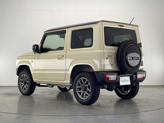 スズキ ジムニー XC 宮崎県 2023(令5)年 1.4万km シフォンアイボリーメタリックブラック2トーンルーフ 禁煙車/衝突被害軽減ブレーキ/純正8型ナビTV/（Panasonic/CN-RZ875/CD/DVD/Bluetooth/フルセグTV)/純正バックカメラ/純正LEDオートライト/純正フォグ/純正セキュリティアラーム/純正フロアマット/クルーズコントロール/ダウンヒルアシストコントロール/ヒーテッドドアミラー/オートエアコン/本革巻ハンドル/ETC/スマートキー/プッシュエンジンスタート/スペアキー/新車時保証書/取扱い説明書