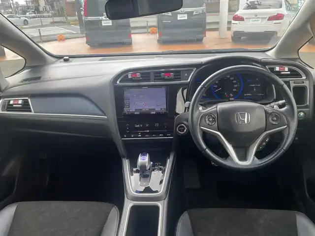 ホンダ シャトル ハイブリッド X スタイルエディション 三重県 2016(平28)年 11.8万km ホワイトオーキッドパール 外部検査済み/ワンオーナー/カロッツェリアメモリナビ/　＊フルセグテレビ/DVD/CD/Bluetooth/バックカメラ/クルーズコントロール/シティブレーキアクティブシステム/LEDヘッドランプ/オートライト/ボディ同色電動オート格納ドアミラー/革巻きステアリングホイール/ステアリングスイッチ/プラズマクラスター付きオートエアコン/SRSエアバック（運転席/助手席/サイド/カーテン）/ビルトインETC/スマートキーシステム/プッシュスタート