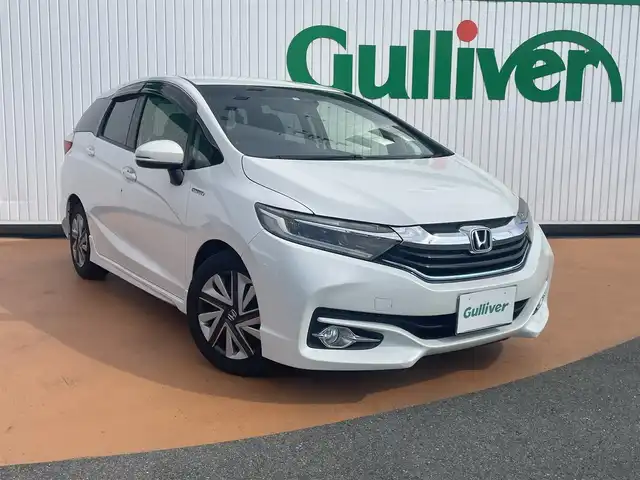 ホンダ シャトル ハイブリッド X スタイルエディション 三重県 2016(平28)年 11.8万km ホワイトオーキッドパール 外部検査済み/ワンオーナー/カロッツェリアメモリナビ/　＊フルセグテレビ/DVD/CD/Bluetooth/バックカメラ/クルーズコントロール/シティブレーキアクティブシステム/LEDヘッドランプ/オートライト/ボディ同色電動オート格納ドアミラー/革巻きステアリングホイール/ステアリングスイッチ/プラズマクラスター付きオートエアコン/SRSエアバック（運転席/助手席/サイド/カーテン）/ビルトインETC/スマートキーシステム/プッシュスタート