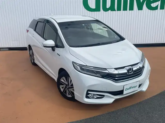 ホンダ シャトル ハイブリッド X スタイルエディション 三重県 2016(平28)年 11.8万km ホワイトオーキッドパール 外部検査済み/ワンオーナー/カロッツェリアメモリナビ/　＊フルセグテレビ/DVD/CD/Bluetooth/バックカメラ/クルーズコントロール/シティブレーキアクティブシステム/LEDヘッドランプ/オートライト/ボディ同色電動オート格納ドアミラー/革巻きステアリングホイール/ステアリングスイッチ/プラズマクラスター付きオートエアコン/SRSエアバック（運転席/助手席/サイド/カーテン）/ビルトインETC/スマートキーシステム/プッシュスタート