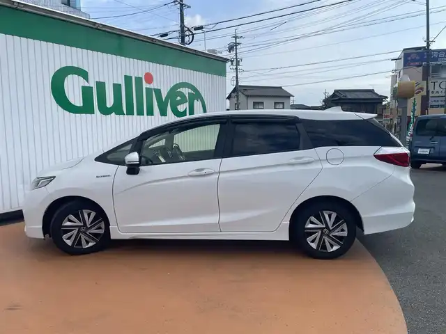 ホンダ シャトル ハイブリッド X スタイルエディション 三重県 2016(平28)年 11.8万km ホワイトオーキッドパール 外部検査済み/ワンオーナー/カロッツェリアメモリナビ/　＊フルセグテレビ/DVD/CD/Bluetooth/バックカメラ/クルーズコントロール/シティブレーキアクティブシステム/LEDヘッドランプ/オートライト/ボディ同色電動オート格納ドアミラー/革巻きステアリングホイール/ステアリングスイッチ/プラズマクラスター付きオートエアコン/SRSエアバック（運転席/助手席/サイド/カーテン）/ビルトインETC/スマートキーシステム/プッシュスタート