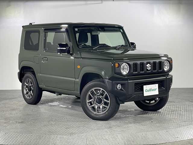 スズキ ジムニー XC 沖縄県 2024(令6)年 0.1万km ジャングルグリーン 禁煙車　/ススキ純正９インチナビ(AVIC-RQS720ZS)/【ＣＤ/ＤＶＤ/フルセグＴＶ/Ｂｌｕｅｔｏｏｔｈ】/バックカメラ/シートヒーター/ＥＴＣ/スマートキー/プッシュスタート/純正アルミ/レーダーブレーキサポート/背面タイヤ/４ＷＤ/保証書/取扱説明書