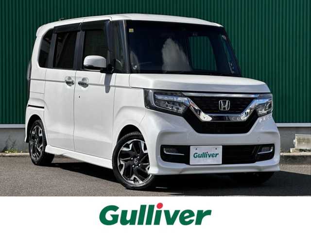 ホンダ Ｎ ＢＯＸ カスタム G L ターボ ホンダセンシング 宮城県 2018(平30)年 6.1万km プラチナホワイトパール ホンダセンシング/●衝突軽減ブレーキ〈CMBS〉/●誤発進抑制機能/●後方誤発進抑制機能/●歩行者事故低減ステアリング/●路外逸脱抑制機能/●ACC〈アダプティブ・クルーズ・コントロール〉/●LKAS〈車線維持支援システム〉/●オートハイビーム/●先行車発進お知らせ機能/●標識認識機能/Gathersプレミアムインターナビ(8インチ)/フルセグTV/CD/DVD/Bluetooth/SD/AUX/CD録音可/バックカメラ/両側パワースライドドア/ドライブレコーダー/ハーフレザーシート/LEDヘッドライト/ステアリングスイッチ/パドルシフト/サンシェード/USBポート×3/ウインカーミラー/ETC/取扱説明書/スペアキー