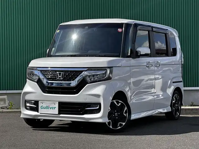 ホンダ Ｎ ＢＯＸ カスタム G L ターボ ホンダセンシング 宮城県 2018(平30)年 6.1万km プラチナホワイトパール ホンダセンシング/●衝突軽減ブレーキ〈CMBS〉/●誤発進抑制機能/●後方誤発進抑制機能/●歩行者事故低減ステアリング/●路外逸脱抑制機能/●ACC〈アダプティブ・クルーズ・コントロール〉/●LKAS〈車線維持支援システム〉/●オートハイビーム/●先行車発進お知らせ機能/●標識認識機能/Gathersプレミアムインターナビ(8インチ)/フルセグTV/CD/DVD/Bluetooth/SD/AUX/CD録音可/バックカメラ/両側パワースライドドア/ドライブレコーダー/ハーフレザーシート/LEDヘッドライト/ステアリングスイッチ/パドルシフト/サンシェード/USBポート×3/ウインカーミラー/ETC/取扱説明書/スペアキー