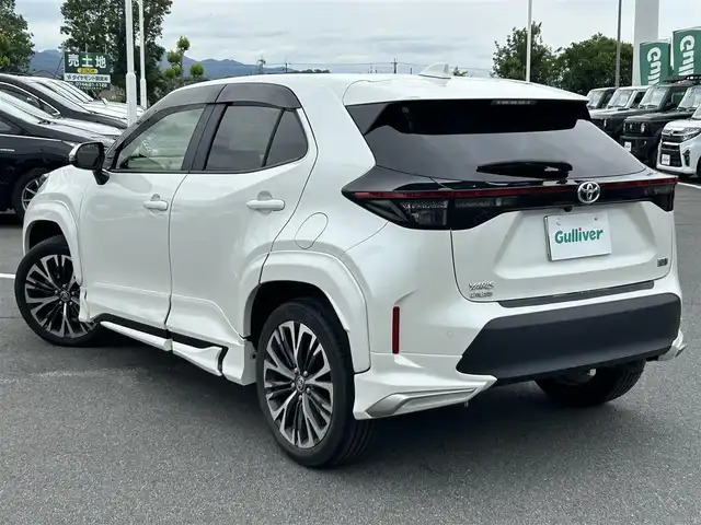 トヨタ ヤリスクロス ハイブリッド Z 奈良県 2022(令4)年 1.9万km ホワイトパールクリスタルシャイン 純正ディスプレイオーディオ/(AM/FM/BT/USB)/モデリスタフルエアロ/BSM/パノラマモニター/ハーフレザーシート/シートヒーター/レーダークルーズコントロール/プリクラッシュセーフティ/オートマチックハイビーム/クリアランスソナー/電動サイドブレーキ/革巻きステアリング/ステアリングスイッチ/パワーバックドア/オートライト/ビルトインETC/前後ドライブレコーダー/横滑り防止装置/純正フロアマット/純正ドアバイザー/プッシュスタート/電格ウインカーミラー