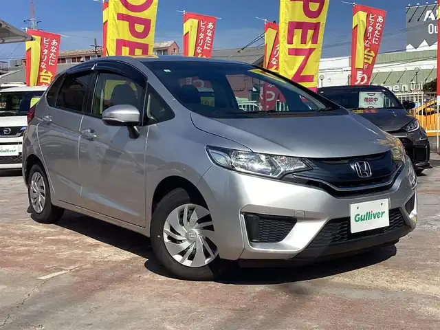 ホンダ フィット 13G Fパッケージ 京都府 2013(平25)年 3.9万km アラバスターシルバーメタリック ワンオーナー/純正ナビ(VXM-145C)/　CD BT SD/スマートキー/横滑り防止装置/アイドリングストップ/スペアスマートキー/新車保証書/取扱説明書