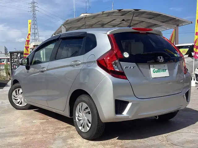 ホンダ フィット 13G Fパッケージ 京都府 2013(平25)年 3.9万km アラバスターシルバーメタリック ワンオーナー/純正ナビ(VXM-145C)/　CD BT SD/スマートキー/横滑り防止装置/アイドリングストップ/スペアスマートキー/新車保証書/取扱説明書