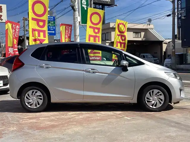 ホンダ フィット 13G Fパッケージ 京都府 2013(平25)年 3.9万km アラバスターシルバーメタリック ワンオーナー/純正ナビ(VXM-145C)/　CD BT SD/スマートキー/横滑り防止装置/アイドリングストップ/スペアスマートキー/新車保証書/取扱説明書