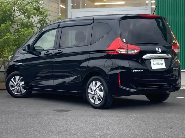 ホンダ フリード ハイブリット G ホンダセンシング 岡山県 2022(令4)年 4.8万km クリスタルブラックパール 純正9インチナビ　VXM-227VFNi/フルセグTV、CD、DVD、Bluetooth、AM、FM/10.1インチフリップダウンモニター/VM-221T/ビルトインETC/バックカメラ/両側パワースライドドア/USB、HDMIポート/レーダークルーズコントロール/前後ドライブレコーダー/スマートキー/プッシュスタート/前席シートヒーター/ホンダセンシング