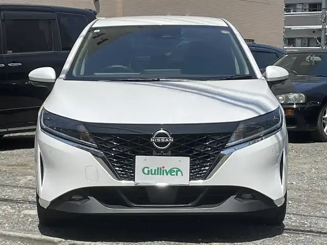 日産 ノート X 静岡県 2021(令3)年 2.3万km ピュアホワイトパール ワンオーナー/プロパイロット/純正メモリナビ/　（フルセグTV/Bluetooth/HDMI/USB）/インテリジェントアラウンドビューモニター/ETC/前方ドライブレコーダー/デジタルインナーミラー/360°セーフティアシスト/・インテリジェント エマージェンシーブレーキ/・インテリジェント FCW（前方衝突予測警報）/・インテリジェント LI（車線逸脱防止支援システム）/　＋LDW（車線逸脱警報）/・インテリジェント DA（ふらつき警報）/・踏み間違い衝突防止アシスト/・標識検知機能/オートマチックハイビーム/横滑り防止装置/スマートキー/置くだけ充電/純正LEDヘッドライト/スペアキー1本/保証書/取扱説明書
