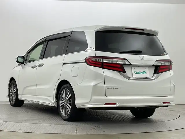 ホンダ オデッセイ G エアロ ホンダセンシング 新潟県 2018(平30)年 7.6万km プラチナホワイトパール ワンオーナー/純正９インチメモリナビ/フルセグ/　CD/DVD/Bluetooth/VXM-187FNi/バックカメラ/両側パワースライドドア/スマートキー×２/衝突被害軽減ブレーキ/レーダークルーズコントロール/LEDヘッドライト/オートライト/ETC2.0/フォグランプ/レーンアシスト/プッシュスタート/社外アルミ付きスタッドレス/　（積み込み７mm）