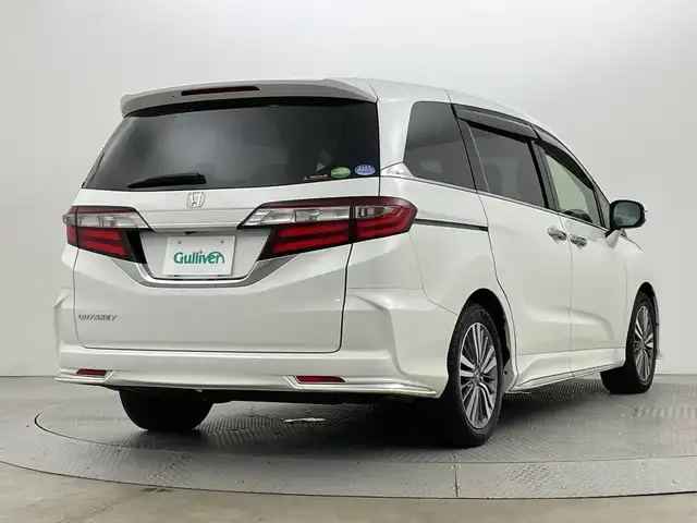 ホンダ オデッセイ G エアロ ホンダセンシング 新潟県 2018(平30)年 7.6万km プラチナホワイトパール ワンオーナー/純正９インチメモリナビ/フルセグ/　CD/DVD/Bluetooth/VXM-187FNi/バックカメラ/両側パワースライドドア/スマートキー×２/衝突被害軽減ブレーキ/レーダークルーズコントロール/LEDヘッドライト/オートライト/ETC2.0/フォグランプ/レーンアシスト/プッシュスタート/社外アルミ付きスタッドレス/　（積み込み７mm）