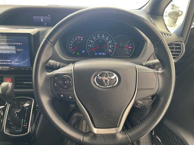 トヨタ ノア Si ダブルバイビー 愛知県 2018(平30)年 5.7万km ブラック 純正9型ナビ/後席モニター/両側パワースライドドア/クルーズコントロール/バックカメラ/純正アルミホイール/LEDヘッドライト/リアオートエアコン/オートマチックハイビーム/ETC/衝突軽減システム/フルセグ/CD DVD/Bluetooth/ステアリングスイッチ/スマートキー/プッシュスタート