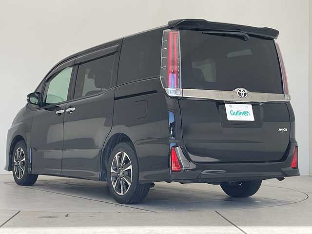 トヨタ ノア Si ダブルバイビー 愛知県 2018(平30)年 5.7万km ブラック 純正9型ナビ/後席モニター/両側パワースライドドア/クルーズコントロール/バックカメラ/純正アルミホイール/LEDヘッドライト/リアオートエアコン/オートマチックハイビーム/ETC/衝突軽減システム/フルセグ/CD DVD/Bluetooth/ステアリングスイッチ/スマートキー/プッシュスタート