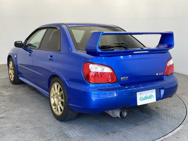 スバル インプレッサ ＷＲＸ STi 栃木県 2004(平16)年 11.6万km WRブルーマイカ ６ＭＴ　/ターボ　/４ＷＤ/社外ナビ/（CD/DVD/Bluetooth/フルセグ）　　/ＥＴＣ　/禁煙車　/純正１７インチアルミホイール　/ＨＩＤヘッドライト　/電動格納ミラー　/純正フロアマット