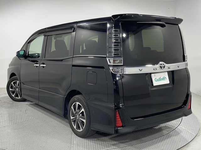 トヨタ ヴォクシー ZS 煌Ⅱ 広島県 2019(令1)年 4.2万km ブラック 純正10型ナビ/純正フリップダウンモニター/両側パワースライドドア/バックカメラ/クルーズコントロール/クリアランスソナー/セーフティセンス/・プリクラッシュセーフティ/・レーンディパーチャーアラート/・オートマチックハイビーム/LEDヘッドランプ/純正16インチAW/ビルトインETC/ドライブレコーダー/USB/HDMI入力端子
