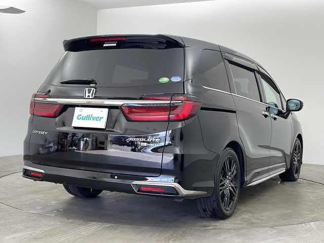 ホンダ オデッセイ ハイブリッド e:HEVアブソルート EX 兵庫県 2021(令3)年 4.6万km プレミアムスパークルブラックパール ・純正9インチナビ/（フルセグ・BT・HDMI・Apple Car Play・Android Auto・DVD・SD）/・全方位カメラ/・ビルトインETC2.0/・前後ドライブレコーダー/・両側パワースライドドア/・パワーバックドア/・ホンダセンシング/・衝突軽減ブレーキ/・誤発進抑制機能/・渋滞追従機能付アダクティブクルーズコントロール/・車線維持支援システム/・先行車発進お知らせ機能/・歩行者事故低減ステアリング/・路外逸脱抑制機能/・標識認識機能/・ブラインドスポットインフォメーション/・パーキングセンサーシステム/・オートハイビーム/・アジャイルハンドリングアシスト/・トラフィックジャムアシスト/・LEDオートライト/・LEDフォグランプ/・電動パーキングブレーキ/・ブレーキホールド/・レザーシート/・パワーシート/・シートヒーター/・オットマン/・ステアリングリモコン/・ECON/・ドアバイザー/・純正18インチアルミホイール/・純正フロアマット/・スマートキー/・プッシュスタート/・W＋サイドエアバック/・カーテンエアバック/・オールオートパワーウィンドウ