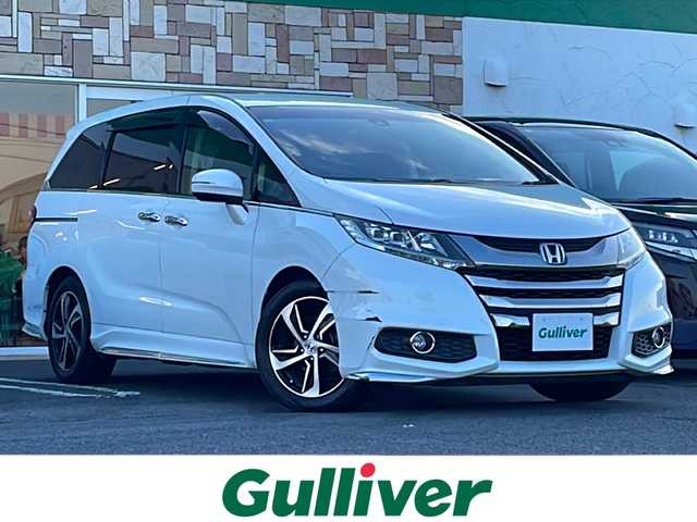 ホンダ オデッセイ アブソルート・Xホンダセンジング 徳島県 2017(平29)年 4.4万km ホワイトオーキッドパール 純正8型SDナビ　VXM-185VFEi/（ラジオ/フルセグ/DISC/SD/BT/USB）/バックカメラ/純正9型フリップダウンモニター/ホンダセンシング/追従式クルーズコントロール/ビルトインETC/ハーフレザーシート/両側電動スライドドア/パドルシフト/純正17AW/プッシュスタート/スマートキー/ドアバイザー/フォグライト/オートライト/純正フロアマット