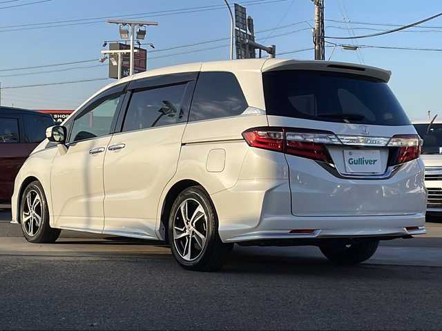ホンダ オデッセイ アブソルート・Xホンダセンジング 徳島県 2017(平29)年 4.4万km ホワイトオーキッドパール 純正8型SDナビ　VXM-185VFEi/（ラジオ/フルセグ/DISC/SD/BT/USB）/バックカメラ/純正9型フリップダウンモニター/ホンダセンシング/追従式クルーズコントロール/ビルトインETC/ハーフレザーシート/両側電動スライドドア/パドルシフト/純正17AW/プッシュスタート/スマートキー/ドアバイザー/フォグライト/オートライト/純正フロアマット